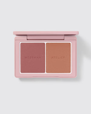Powder Duos palette open showing the Suede / Sable shades.