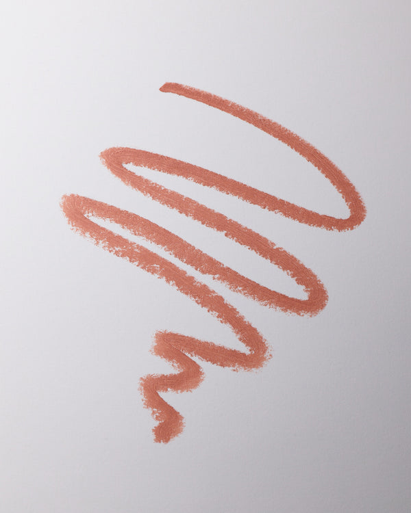 Lip liner swatch in Sable on grey background.