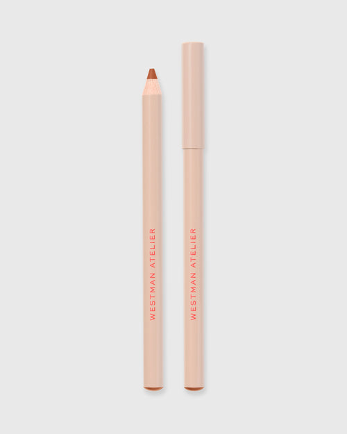Lip liner in Sable on grey background.