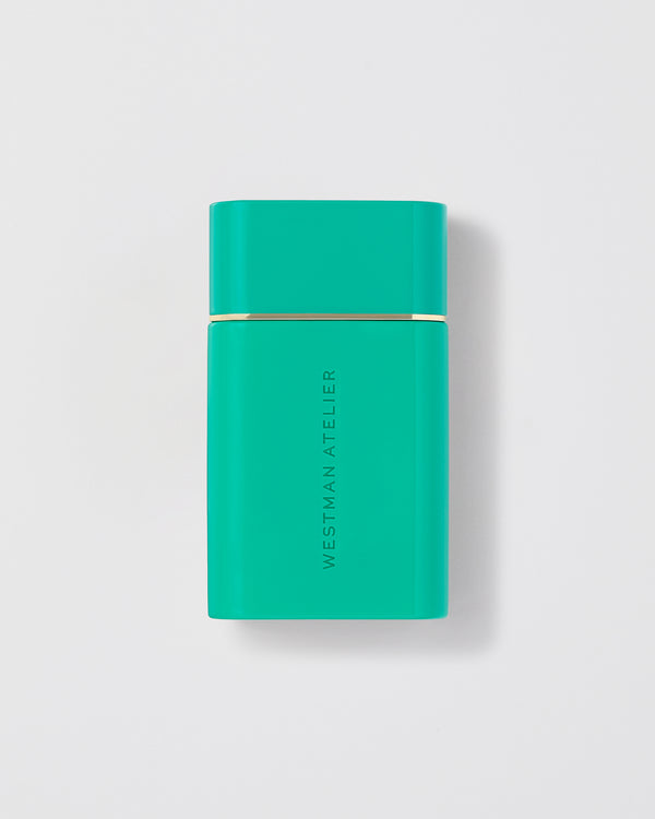 Sun Tone Bronzing Drops in teal packaging.