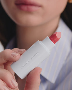 Model applying HydroBalm in Juice.
