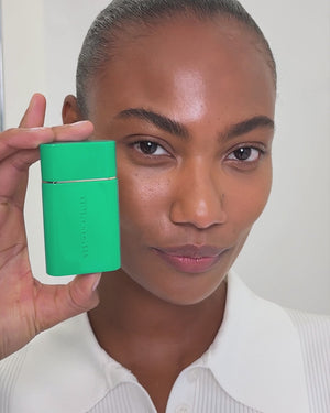 Model applying Sun Tone in shade 4.